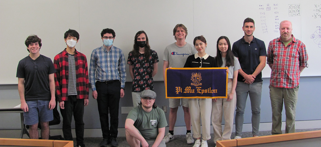 From left: Alex Rankin, Hyunha Park, Paul Bianco, Sam Kahn, Jake Messick, Brandon Koprowski, Shuqing Qi, Shu Qian, Timothy Neumann and speaker Bela Bajnok.