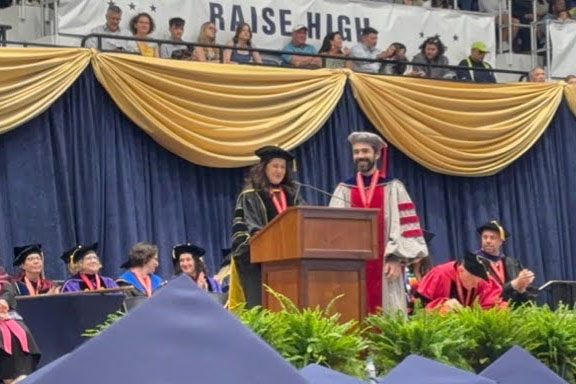 Dean Kavita Daiya and Joel Lewis on stage during CCAS Celebration 2025