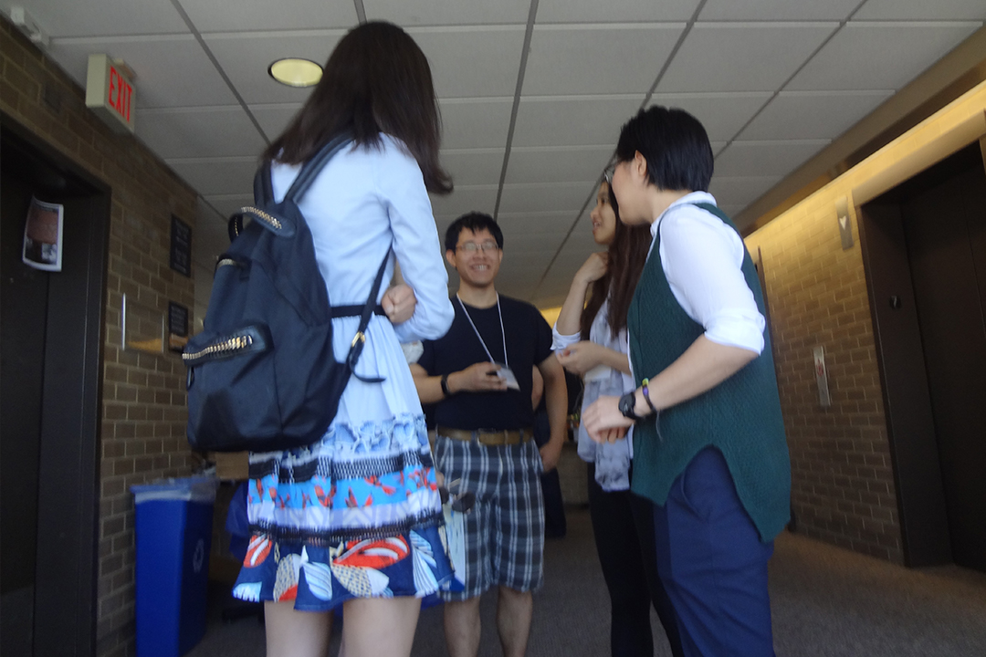 A group of students talking to each other