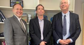 From left, CCAS Dean Paul Wahlbeck, donor John Dixon Sullivan and Math Department Chair Frank Baginski
